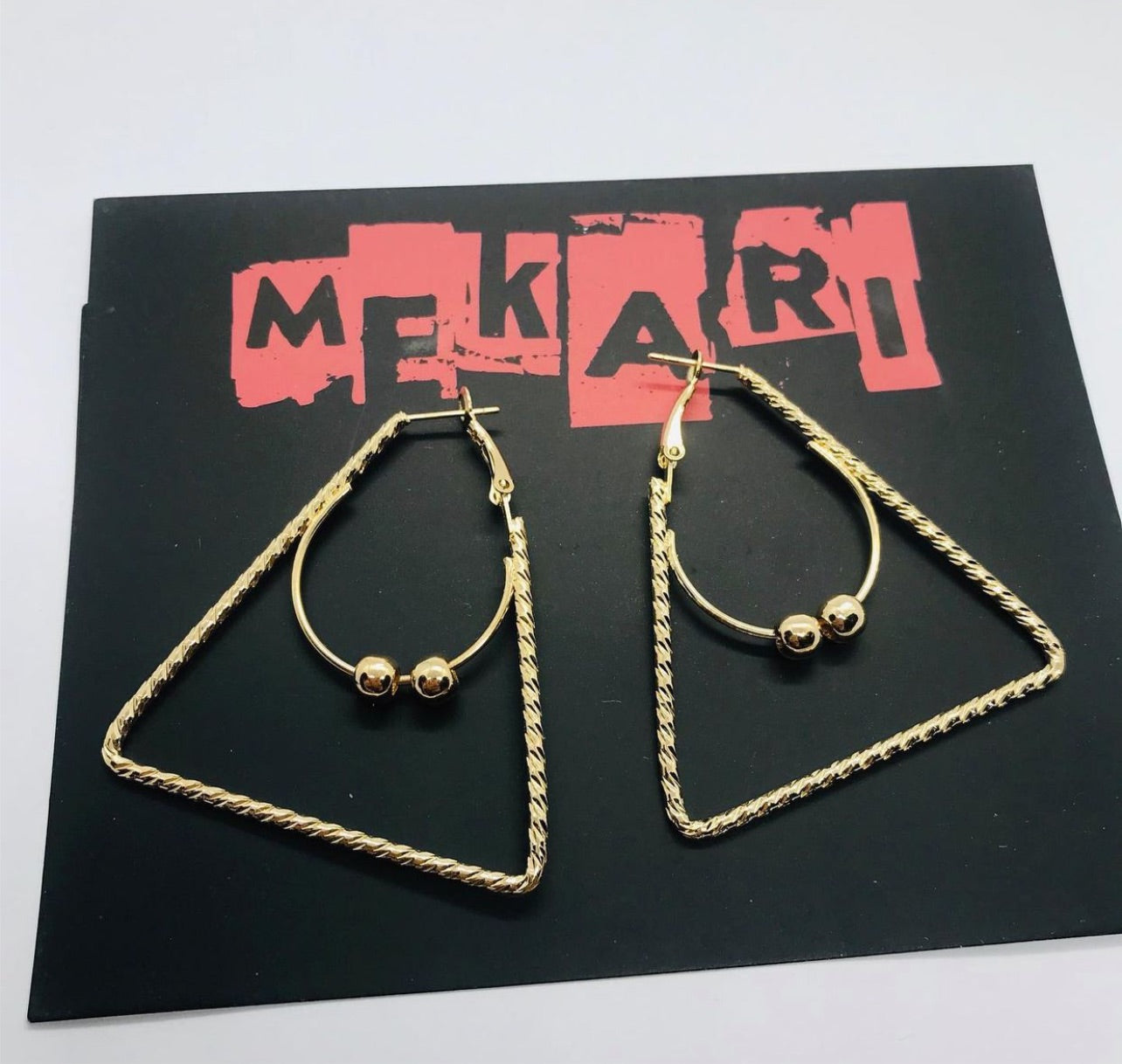 TWISTED TRIANGLE EARRINGS